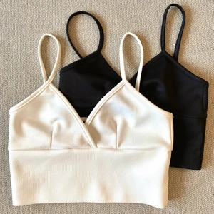 Croptops  - En svart och en vit croptop i halvglansigt material. Stretchiga!  Står stl 36 men skulle säga att de passar XS/34! 40kr/st eller 60kr för båda. 