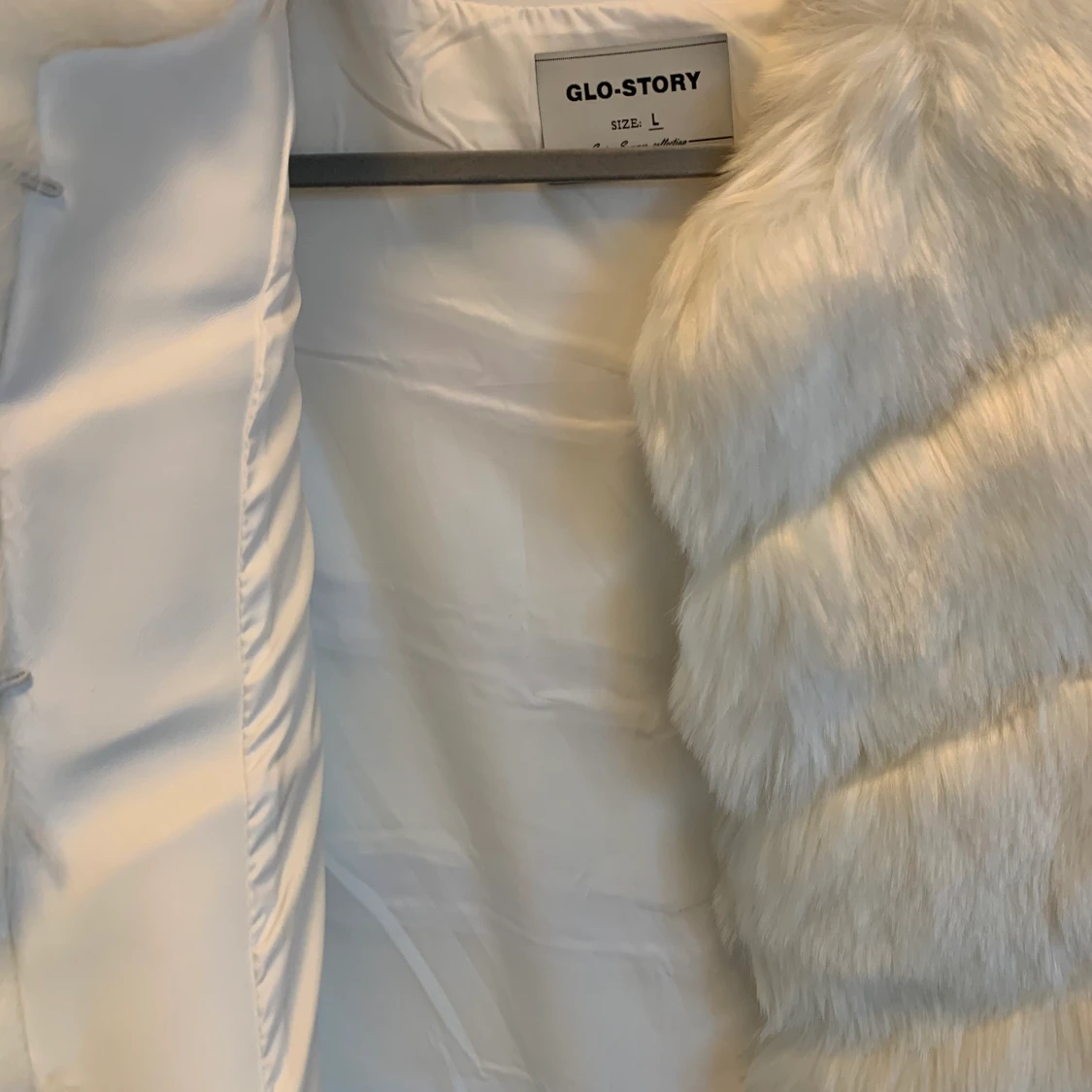 Vit pälsväst  - 91