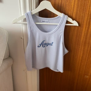 Linne - Oanvänt linne från hidden cult i storlek L.