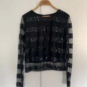 Festlig topp - Jättefin glittertröja