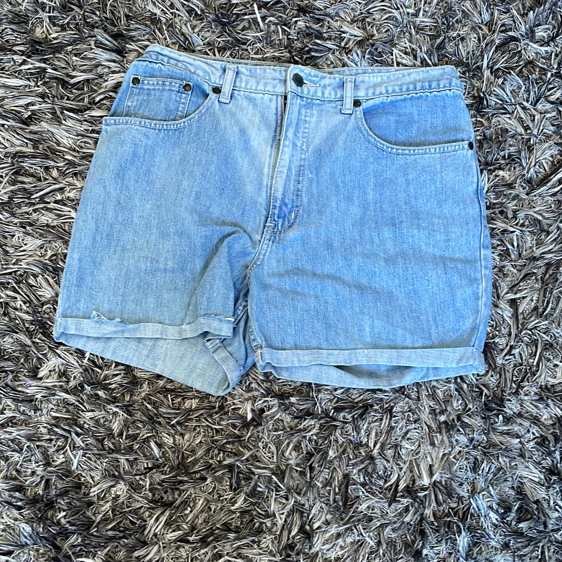Högmidjade ljusblåa shorts  - 91
