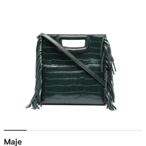 maje väska - Säljer min fina maje väska då den tyvärr inte kommer till användning. Har inget kvitto då jag köpte den second hand men den är äktenhetsbevisad. Finns inga slitage endast att märket är lite avrubbat. Köpte för 2500 & säljer för 1350kr, använd fåtal gånger