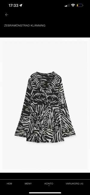 Zara klänning - Snygg klänning från zara med zebra-mönster, helt ny med prislapp kvar. 