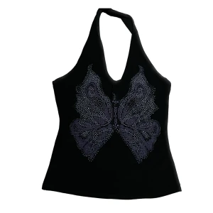 halternecktopp med tryck - svart halterneck med glittrigt tryck,,, aldrig använd 