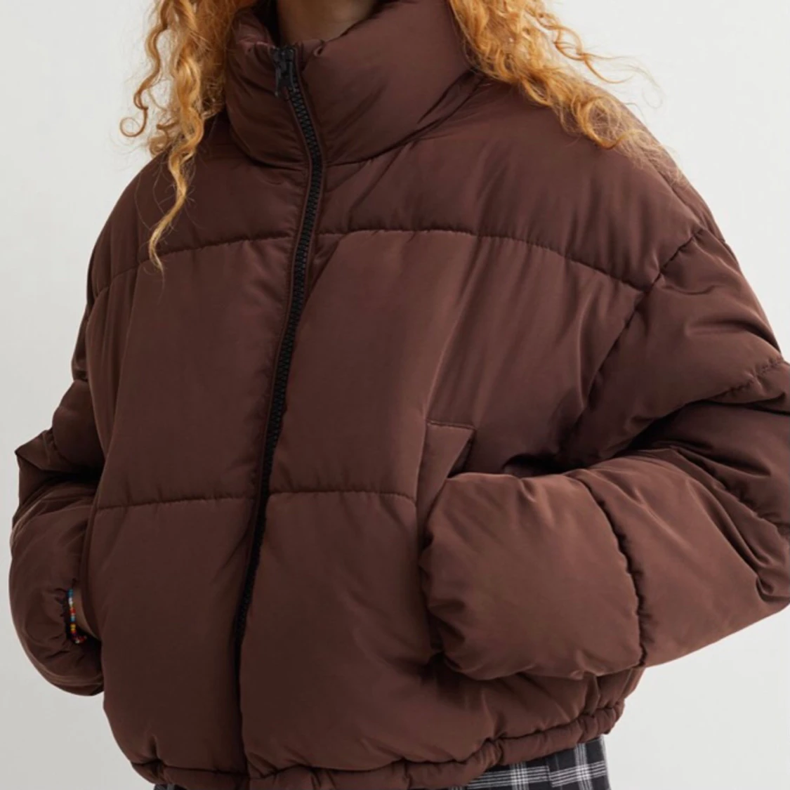 Brun pufferjacka från HM i strl S