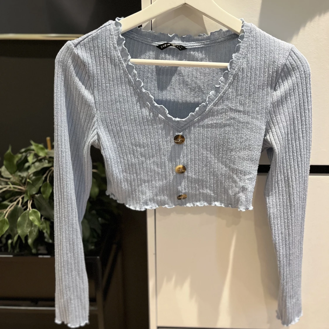 Blå långärmad magtröja