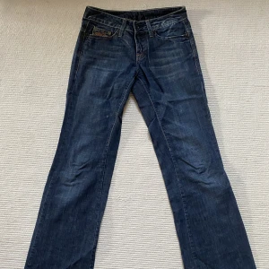 lågmidjade jeans - lågmidjade g star jeans