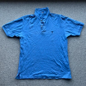 Ralph lauren Piké - En ljusblå piké från Ralph lauren. Storlek XL 8/10. Haft den ett tag. 