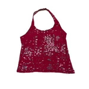 Halterneck topp - Röd halterneck topp, står varken märke eller storlek men skulle säga strl S , slutar strax ovanför naveln! 