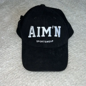 Keps - Svart keps från Aimn