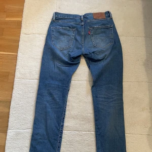 Levi’s Jeans - Ett par välanvända 501 tapered fit, 29 i midjan och 32 i längden 