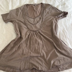 Tröja - En tröja som kanske kan stylas som en klänning. 