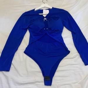 Body  - Säljer denna fina body som passar storlek S/M, ej använd helt ny 