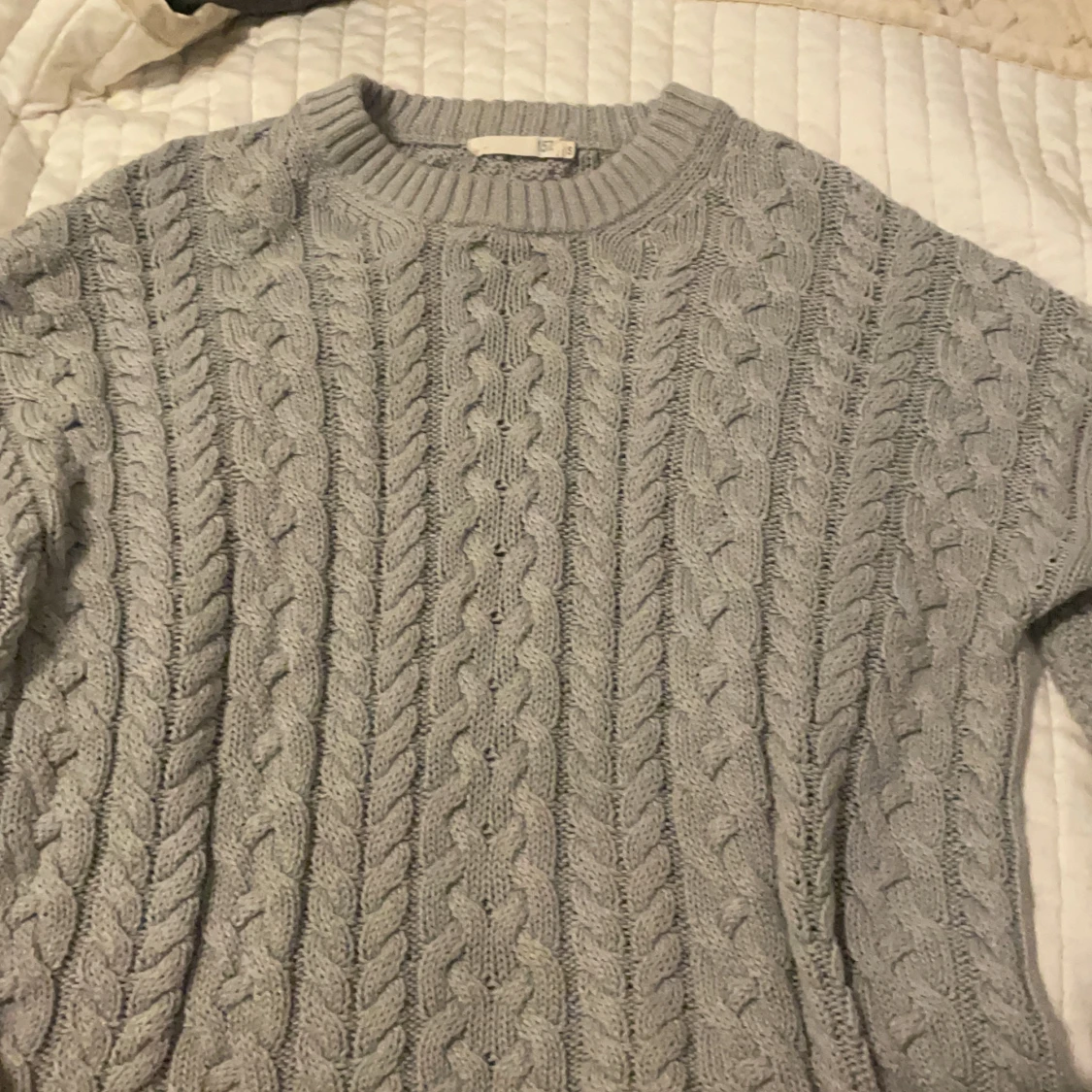 Stickad tröja
