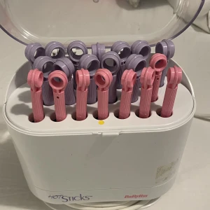 Lock Maskin - Lock maskin som värms först och lockar håret på några sekunder.