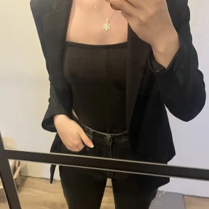 Topp - En svart topp från ASOS design.