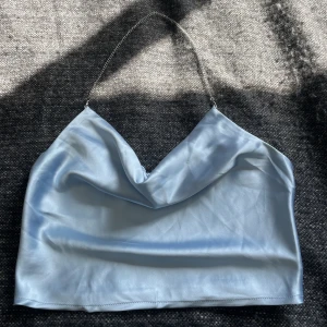 Topp - Aldrig använd då den var för liten.