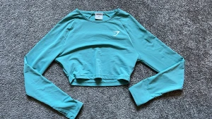 Gymshark topp - Säljer en turkos Gymshark topp pga använder aldrig. Använd 2 gånger så toppenskick. 🦋