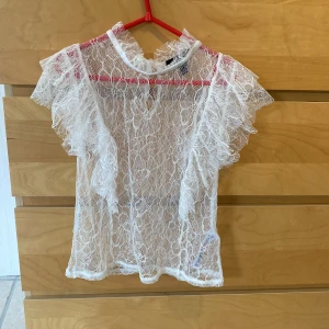 Spetstopp - Spetstopp med volanger