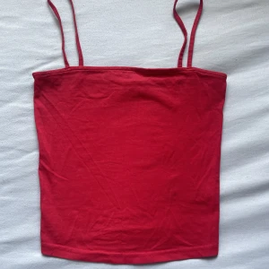 Topp  - Storlek xs, kan även passa en s 