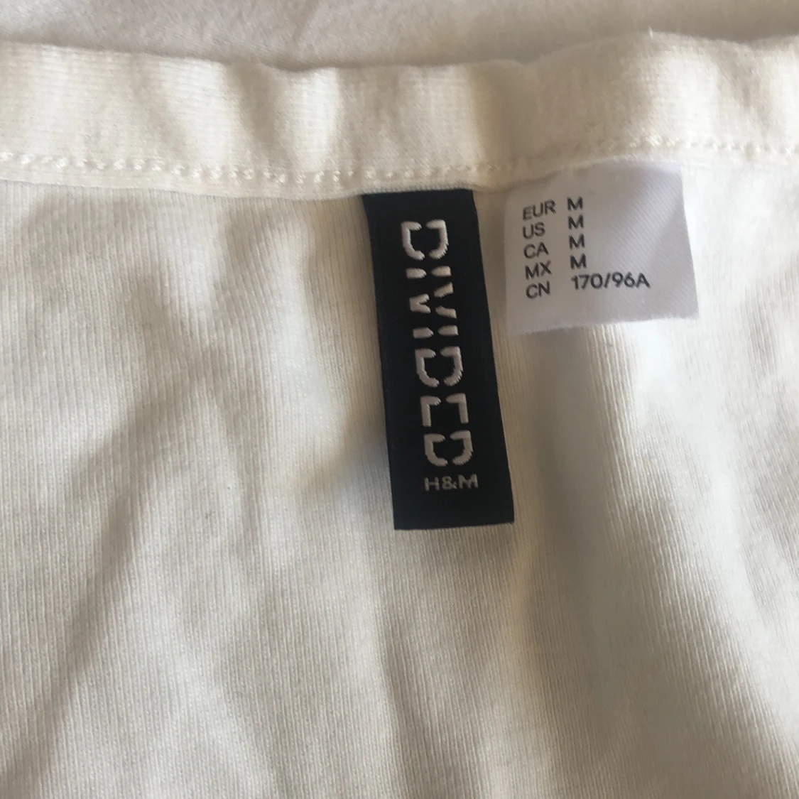 FIN VIT BLUS MED ETT V - 90