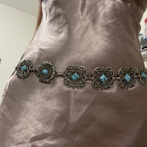 Antique waist belt  - Vintage belt with turquoise stones. The thing at the end broke but I replaced it with another one (see 3rd photo) so it works perfectly.  