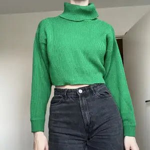 Grön tröja med polokrage 