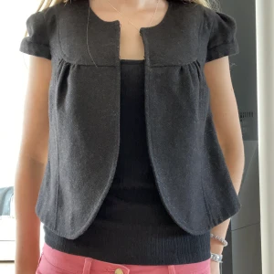 Bolero jacka - Glittrig fest jacka