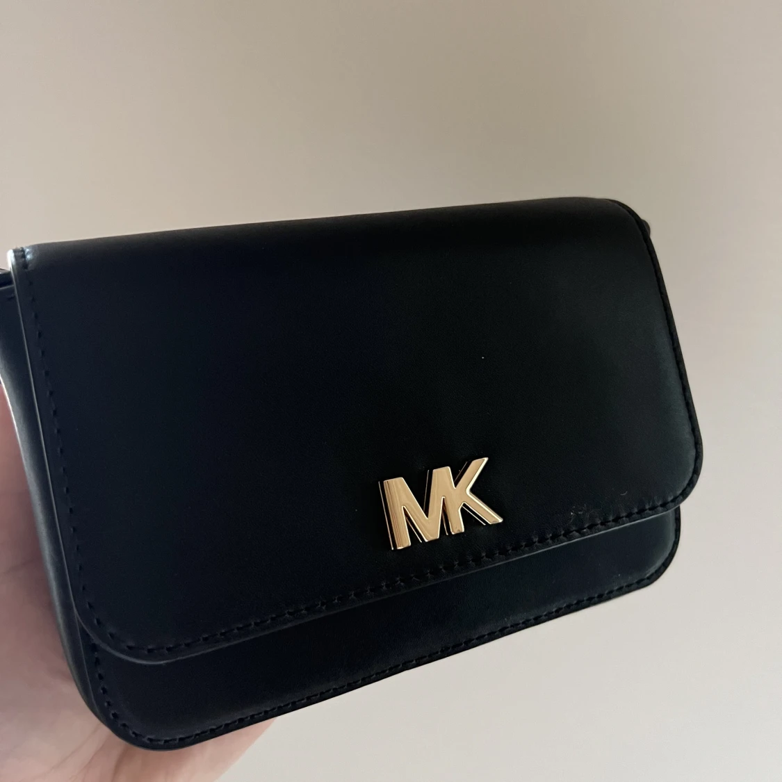 Oanvänd MK magväska