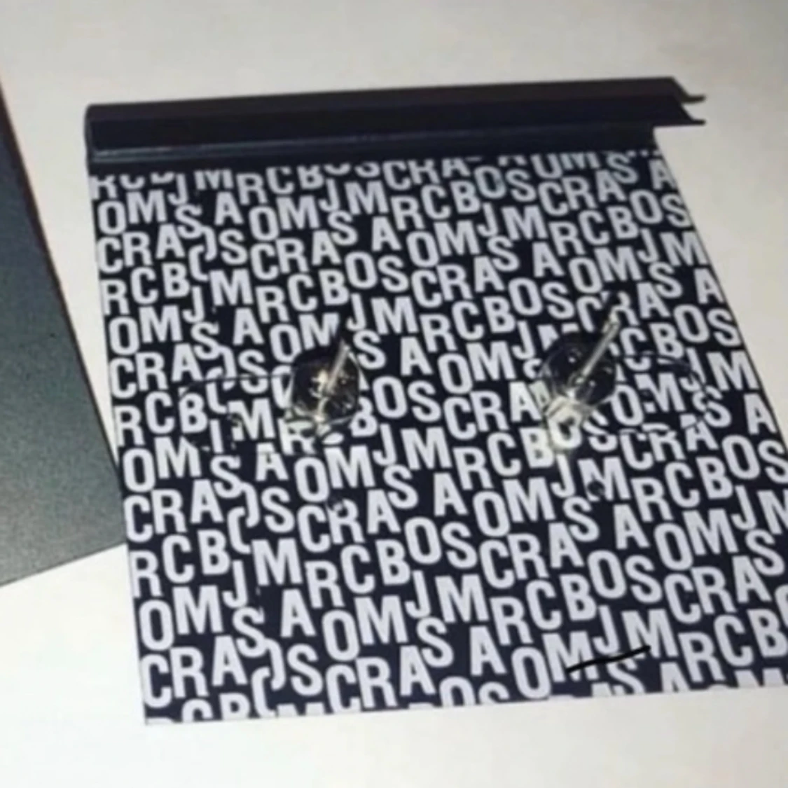 Svarta örhängen  - 90