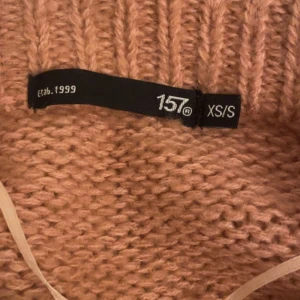 Stickad tröja  - Rosa stickad tröja 