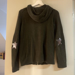 Zadig top - Good conditon! So popular and cute because of the stars on the elbows xx love this zip up! Has a little mark on the front but goes away in the wash!