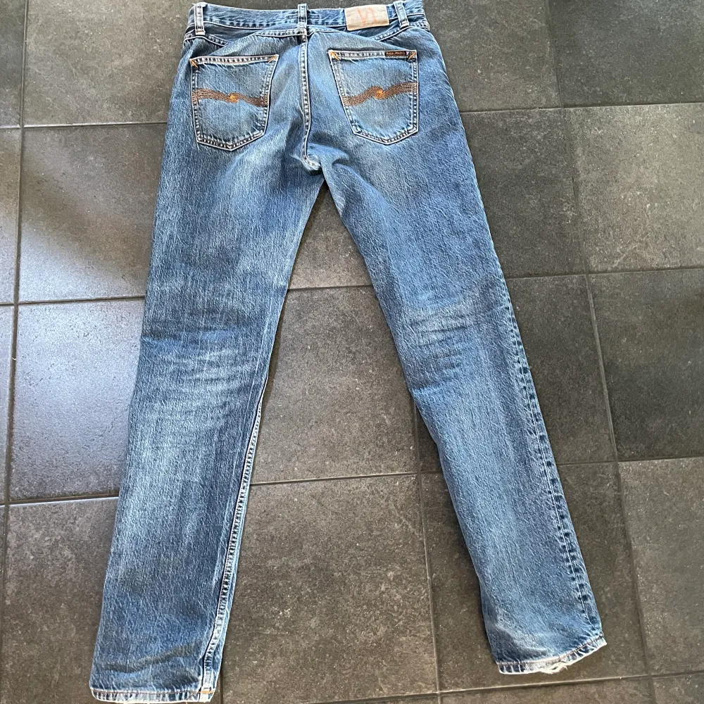 Ett par nudie jeans i modellen gritty jackson i bra skick. Storlek 30/34 . Jeans & Byxor.