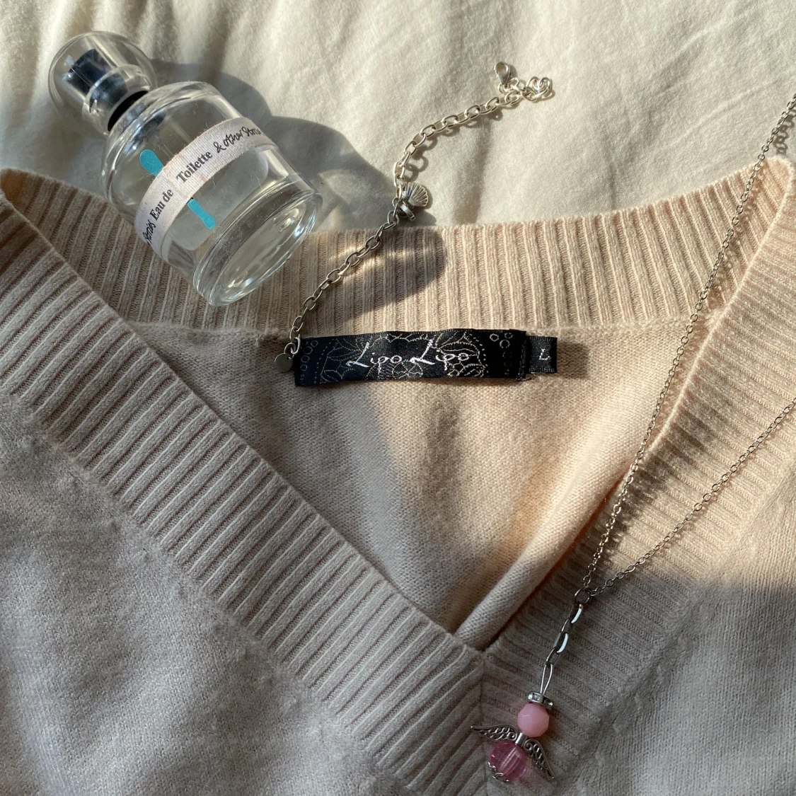 Ljusrosa tröja - 91