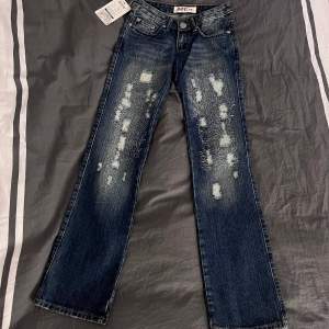 Low waist jeans i storlek xs/34, nya med prislapp
