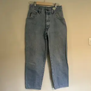 Giorgio Armani vintage denim jeans. Tag says size 30 but fits more like a 26. Waist is 13.5 inches, inseam is about 27 inches 