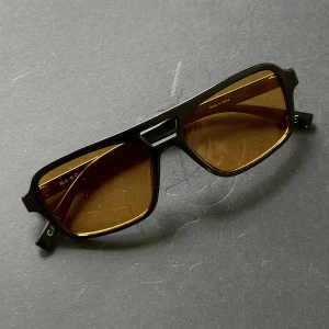 Solglasögon orangea - Skitsnygga