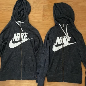 Grå långärmad tröja - Det finns en tröja i M och en i S.