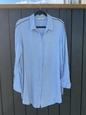 Tom Tailor, skjorta 42 - Good condition, long shirt, 100% viskose, very cozy and comfortable.