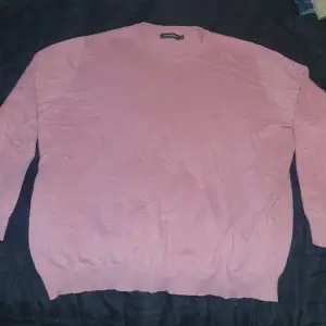 En rosa långärmad tröja ifrån dressman i 3xl