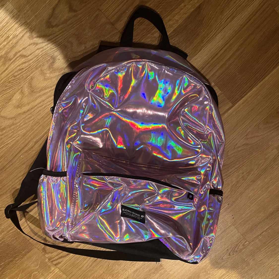 Rosaskimrande ryggsäck