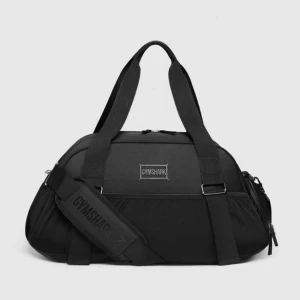 Gymväska - Gymshark  - Helt oanvänd väska från Gymshark! Mått: Length - 52cm Height - 29cm Width - 16 cm Volume - 25L