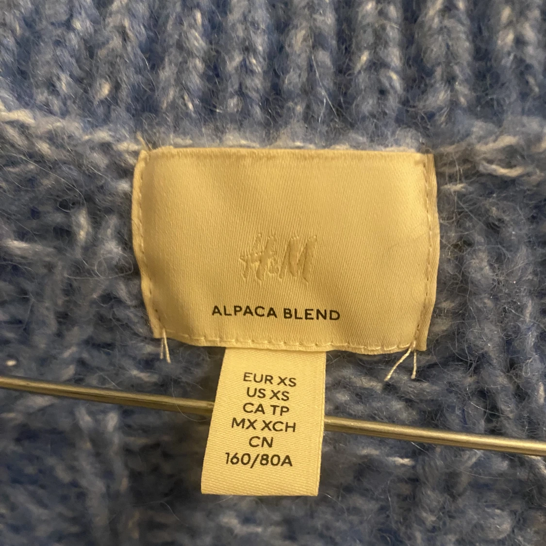 Kabelstickad kofta  - 90