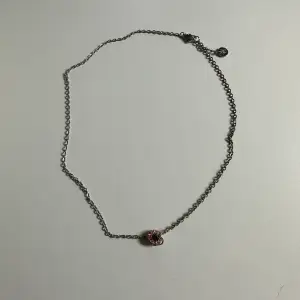 Silver necklace, has a hook to add charm.