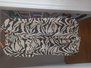 Oanvänd tunika  - Oannänd tuniksa 