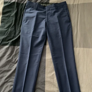 Tiger Of Sweden kostymbyxa  - Kostymbyxa använd 1 gång, mycket bra skick, köpt från Tiger Of Sweden 