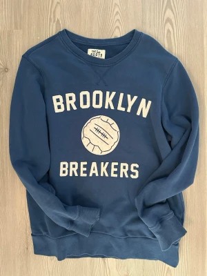 Blå sweatshirt Brooklyn Breakers - Skön vardags tröja. 