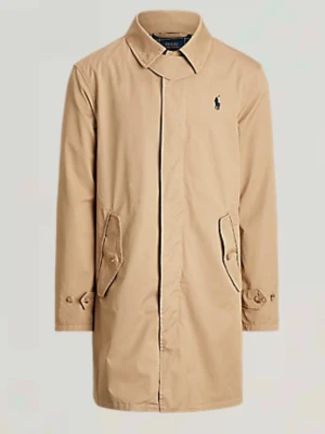 Beige trenchcoat från Polo Ralph Lauren - Klassisk beige trenchcoat från Polo Ralph Lauren med rak passform, knäppning framtill och två fickor med lock. Jackan har en stilren krage och diskret logga broderad på bröstet. Tillverkad i ett tåligt bomullsmaterial som passar perfekt till lager-på-lager. Jackan är som ny då den inte är använd!
