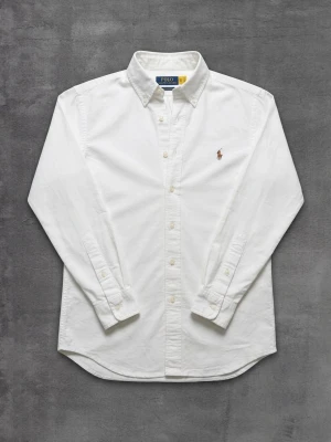 Vit skjorta från Polo Ralph Lauren - Tjena! Säljer nu denna Ralph lauren skjortan. Skicket är 10/10, använd max 1 gång. Vid frågor kontakta garna! Storlek XS sitter om S