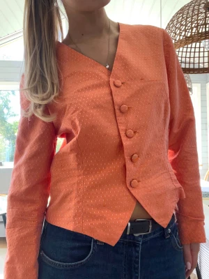 Orange kavaj 